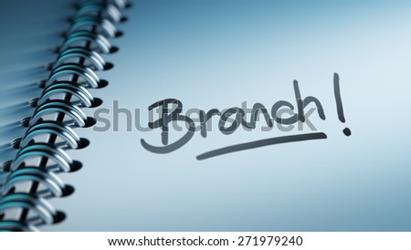 Closeup of a personal calendar setting an important date representing a time schedule. The words Branch written on a white notebook to remind you an important appointment.