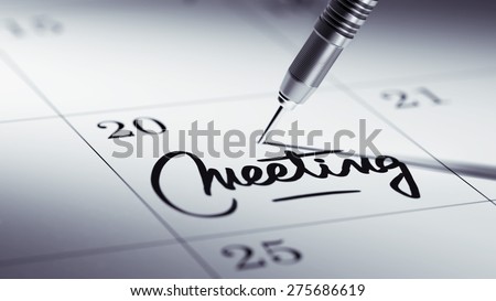 Concept image of a Calendar with a golden dart stick. The words Meeting written on a white notebook to remind you an important appointment.