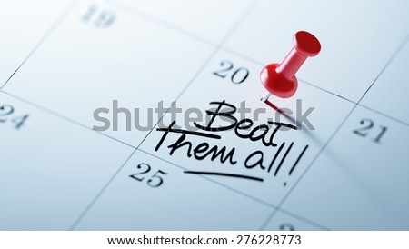 Concept image of a Calendar with a red push pin. Closeup shot of a thumbtack attached. The words Beat them all written on a white notebook to remind you an important appointment.