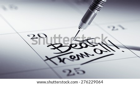 Concept image of a Calendar with a golden dart stick. The words Beat them all written on a white notebook to remind you an important appointment.