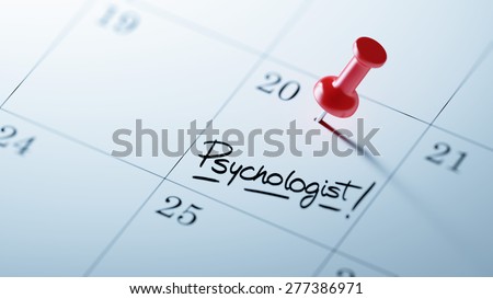 Concept image of a Calendar with a red push pin. Closeup shot of a thumbtack attached. The words Psychologist written on a white notebook to remind you an important appointment.
