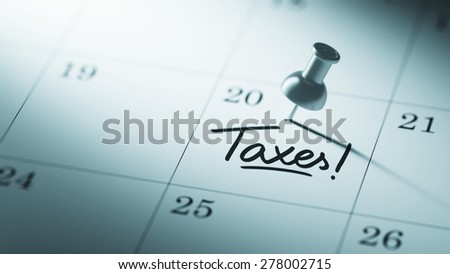 Concept image of a Calendar with a push pin. Closeup shot of a thumbtack attached. The words Taxes written on a white notebook to remind you an important appointment.