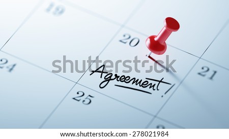Concept image of a Calendar with a red push pin. Closeup shot of a thumbtack attached. The words Agreement written on a white notebook to remind you an important appointment.