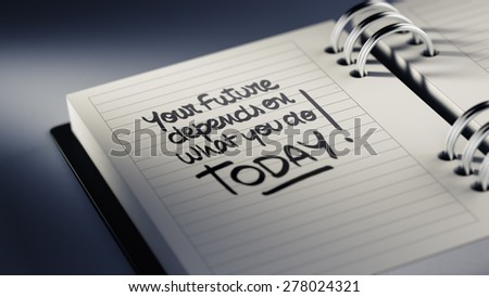 Closeup of a personal agenda setting an important date representing a time schedule. The words Your future depends on what you do today written on a white notebook to remind you an appointment.
