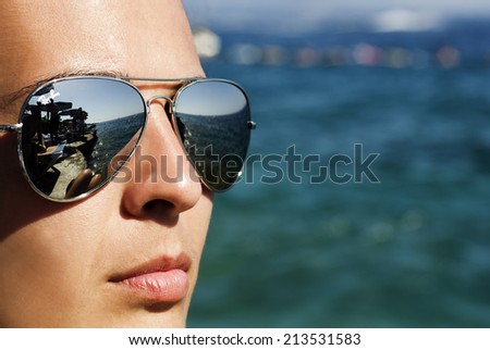 woman on the coastline, macro face