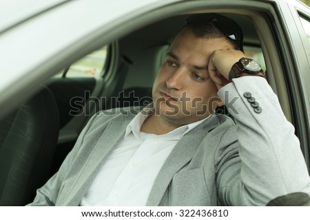 businessman late for work because of traffic jams