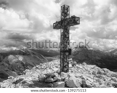 Italian mountains, Sennes, Dolomites, summit cross in black and white