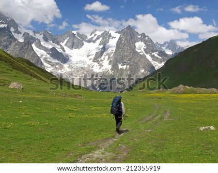 Western Alps, Italian Alps, French Alps, hiker with view to the Mont Blanc massif from the italian side