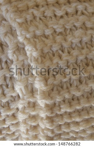 Handmade wool blanket as background.