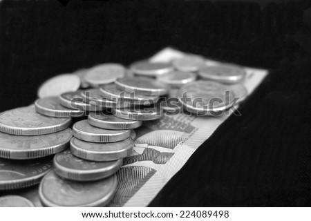 Australian Coins on a Bed of Dollars