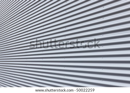 Nice corrugated aluminium wall with diminishing perspective.