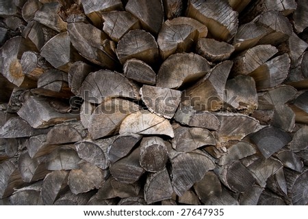 Textured firewood logs piled up