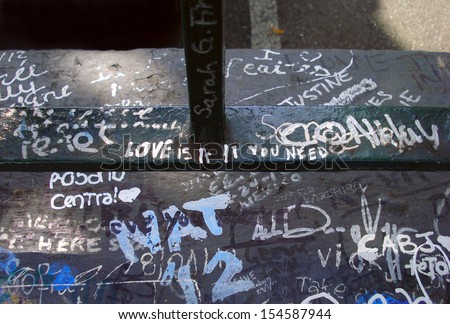 Love is all you need. Message on a fence in Abbey Road, London, UK.