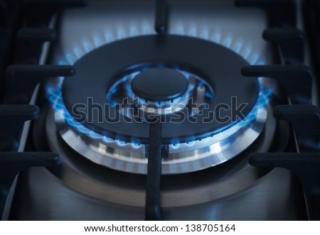 Blue flames from gas kitchen range
