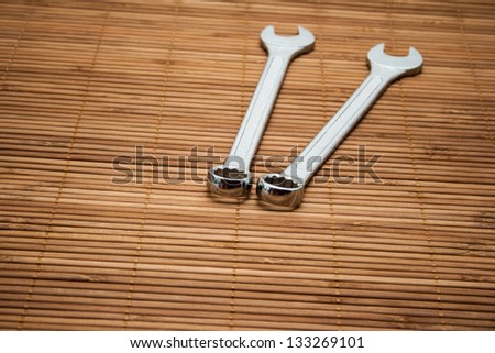 Open End Wrench on wooden underlay