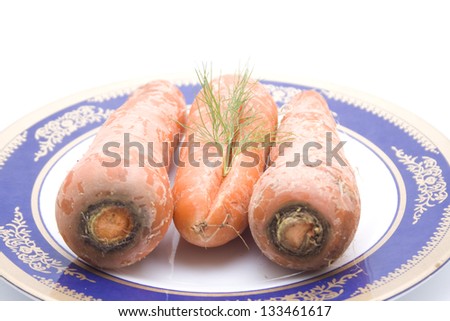 Orange Carrots on plastic Plate