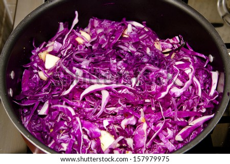 Cooking Sliced Red Cabbage in Cooking Pot