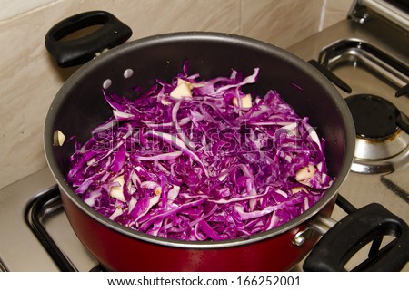 Cooking Sliced Red Cabbage in Cooking Pot