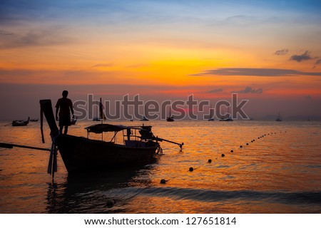 Thai boat silhouette at sunset, Thailand