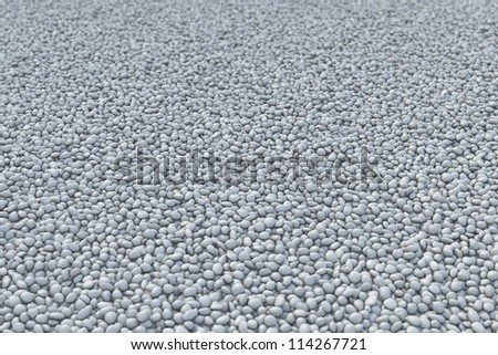Gray gravel with dof on plane ground