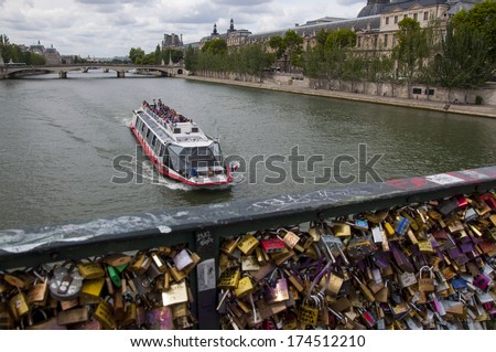 PARIS, FRANCE - AUGUST 14, 2013: View from bridge of the artists in Paris city on Seine