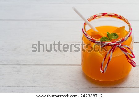 Fresh orange juice, organic from natural at on white  wooden table