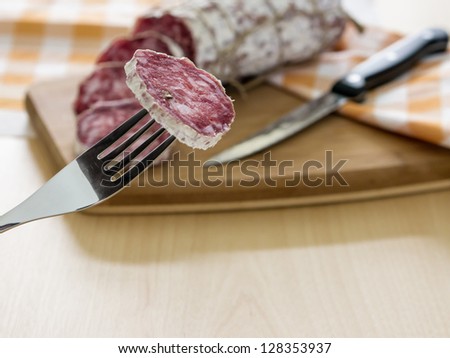 sliced Ã?Â¢??Ã?Â¢??salami on the table