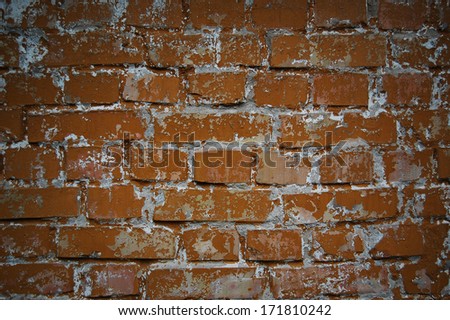 Background of brick wall texture. old red brick. Macro shot. Old weathered red brick wall as background