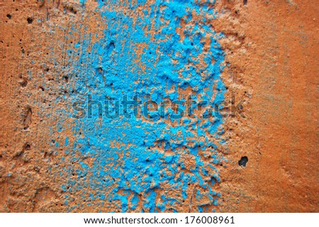 paint wall color background blue orange real texture. Background of old orange painted wall