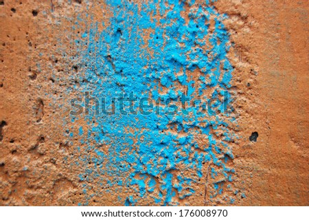 paint wall color background blue orange real texture. Background of old orange painted wall
