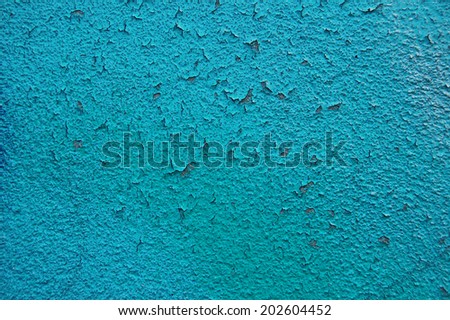 Old cracked paint pattern on rusty background. Peeling paint. Pattern of grunge material. Damaged paint. Scratched old plate