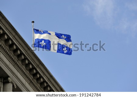 MONTREAL - JUNE 26: A Quebec flying flag is photographed on June 26, 2013 in Montreal, Quebec, Canada.