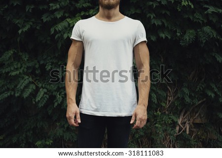 White t-shirt with copy space on a young man