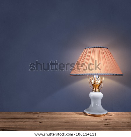 vintage table lamp on blue background