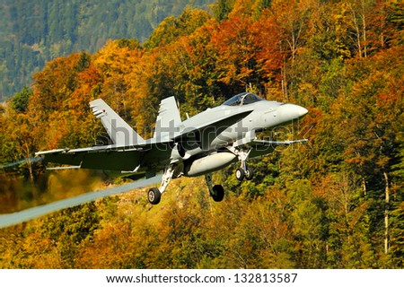 AXALP, SWITZERLAND - OCTOBER 11: Swiss Airforce F/A-18 Hornet during training before Axalp Swiss Air Force Live Firing Demo on October 11, 2011 in Axalp, Switzerland