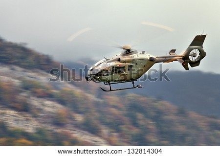 AXALP, SWITZERLAND - OCTOBER 11: Swiss Airforce Eurocopter 635P2+ during training before Axalp Swiss Air Force Live Firing Demo on October 11, 2011 in Axalp, Switzerland