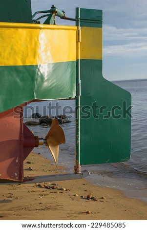 part of the fishing boat, propeller and rudder