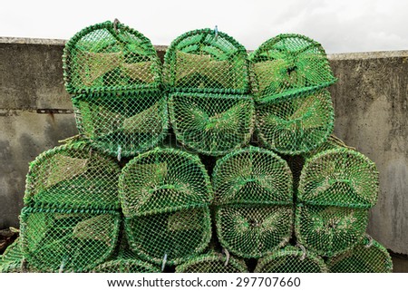 Lobster and Crab traps stack in a port, Scotland, Elgol