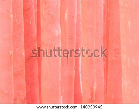 Macro view on the groupation of light red painted wooden sticks/Wooden sticks groupation