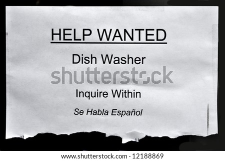 printed help wanted sign at the restaurant window