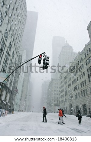 stock-photo-streets-of-new-york-city-covered-with-snow-18430813.jpg