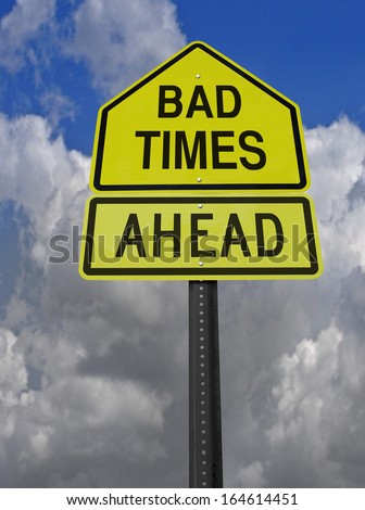 conceptual sign with words bad times ahead warning over blue sky