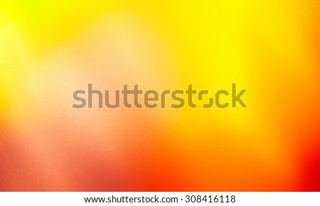 The autumn sun texture, abstract background. Shining warm colors of autumn. Blurry textures
