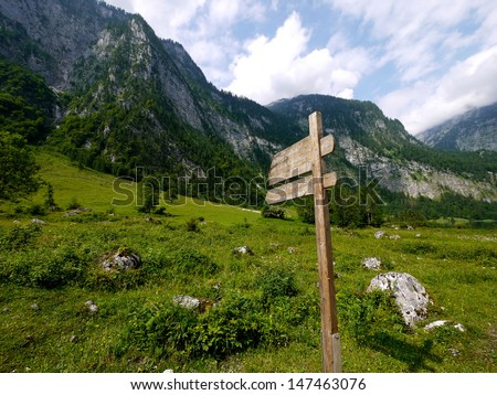 Wooden direction sign at Berchtesgaden national park, Germany
