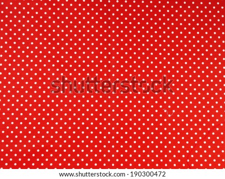 Seamless white and red polka dot background