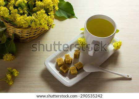 Linden tea cup and woven basket with linden flowers - Tea time