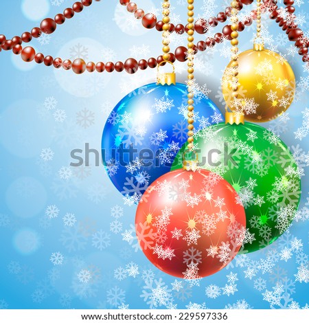 color New Year\'s spheres with the snow on blue a background