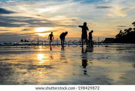 Family Silhouette on the beach