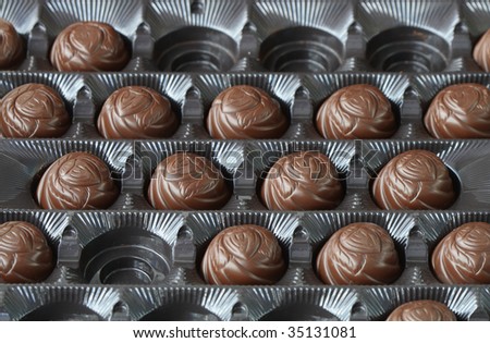 Background made from closeup of chocolate candy box