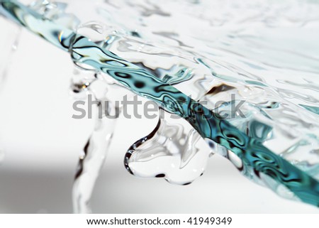 Abstract background with broken glass and flowing water